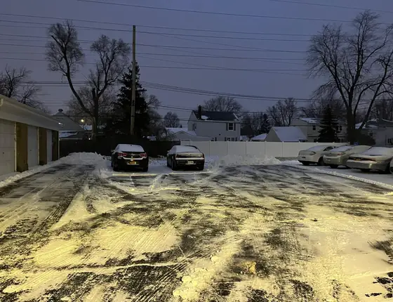 Parking lot plowed in the evening light