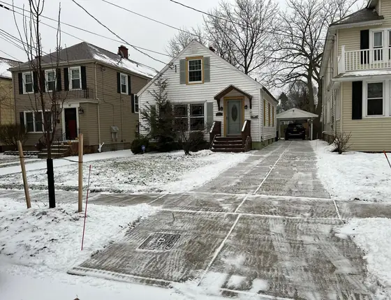 Plowed and salted driveway at a residential home
